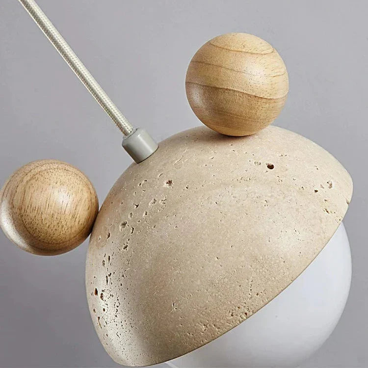 Pendellampe med travertinfinish, legende silhuetdesign