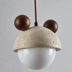 Pendellampe med travertinfinish, legende silhuetdesign