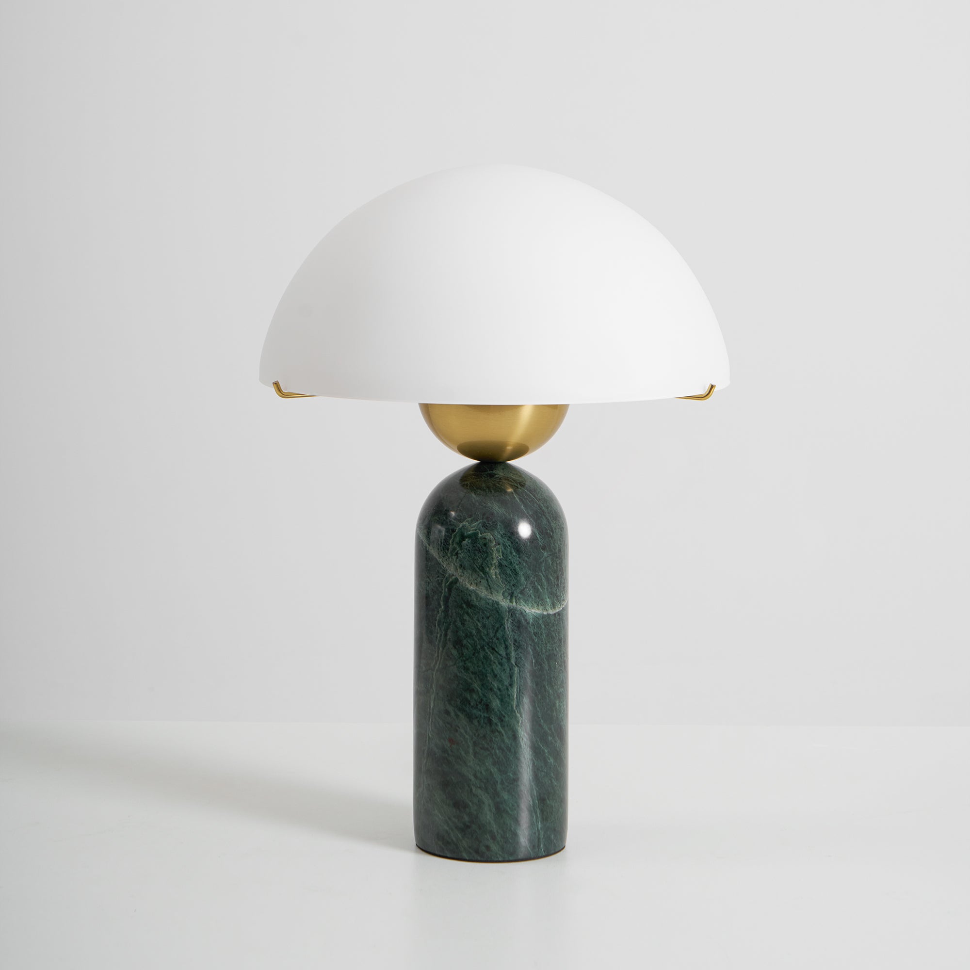 Veviniel table lamp in the green marble base finish, shown straight on against a plain white studio backdrop.