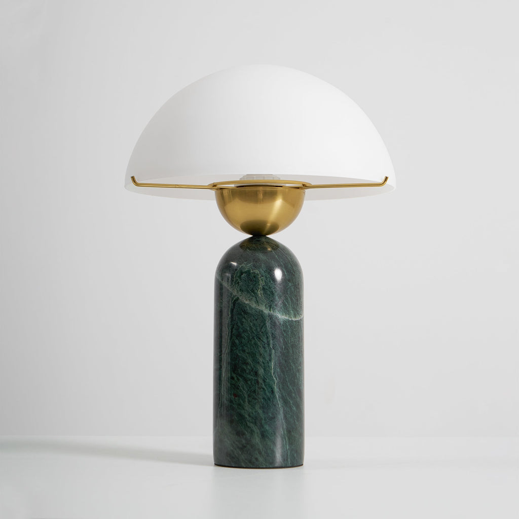 Green marble Veviniel lamp on a white background, seen from above with the socket under the shade.