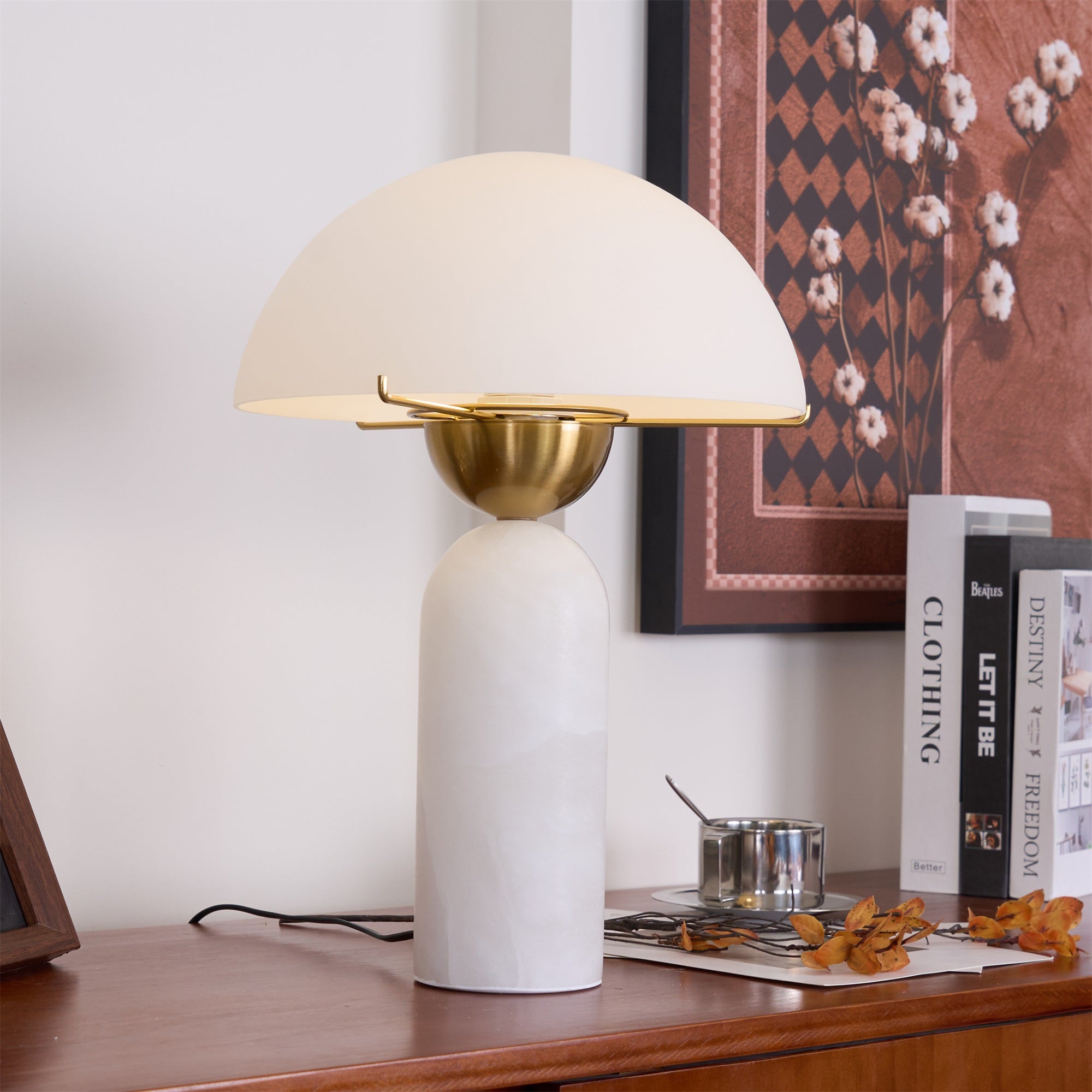 Low-angle view of the Veviniel lamp showing the underside of the shade and its brass bowl fitting.
