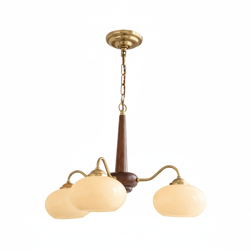 Full length against white, this Clérachic chandelier's three cream shades hang from a dark walnut pole.