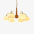 Lit from a slightly different angle, this Clérachic chandelier's six cream shades show against light grey.