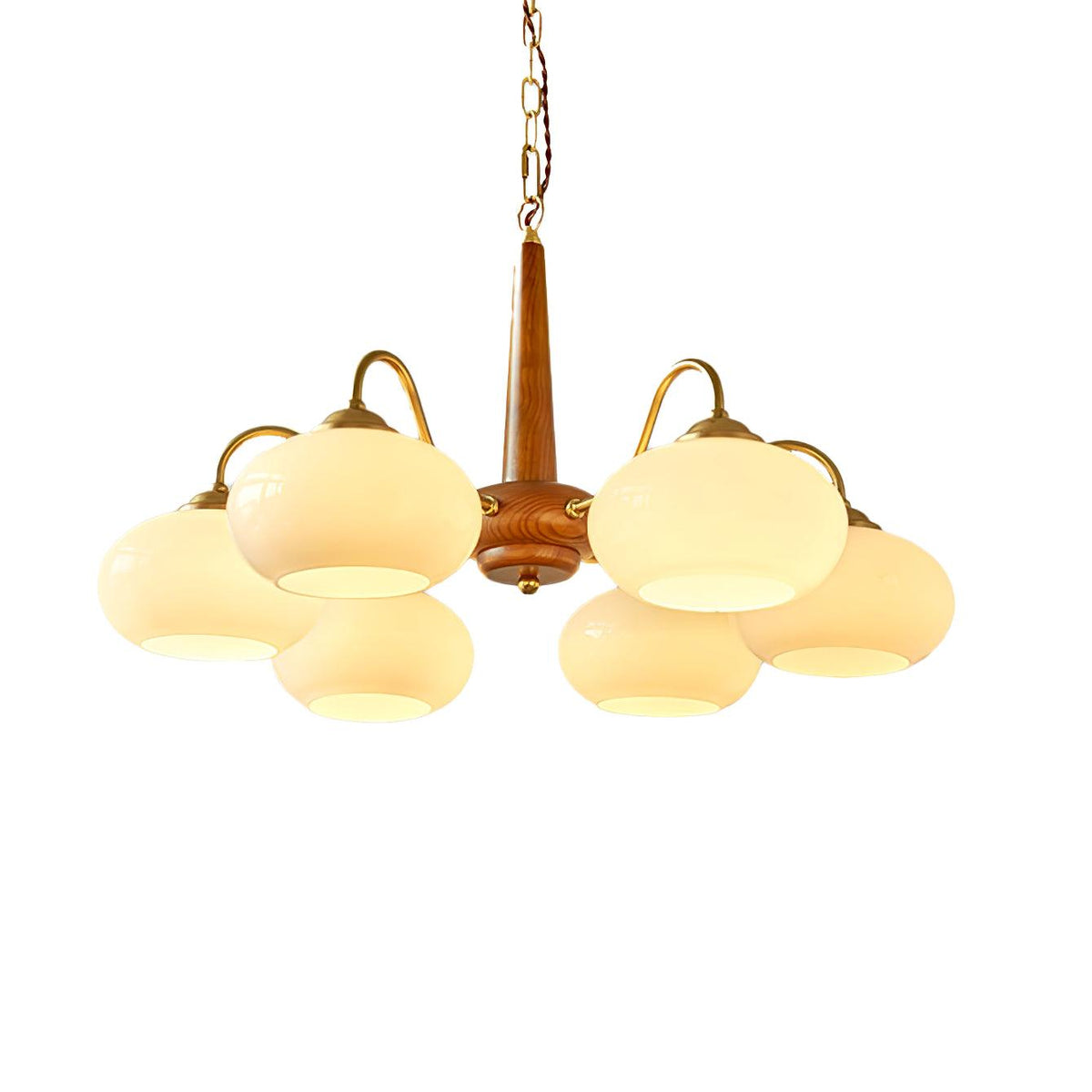 Against a white backdrop, six cream shades on this Clérachic chandelier circle its walnut pole.