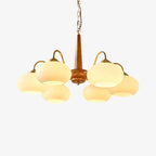 Another studio view shows this Clérachic chandelier's six cream shades fully lit against a plain white backdrop.