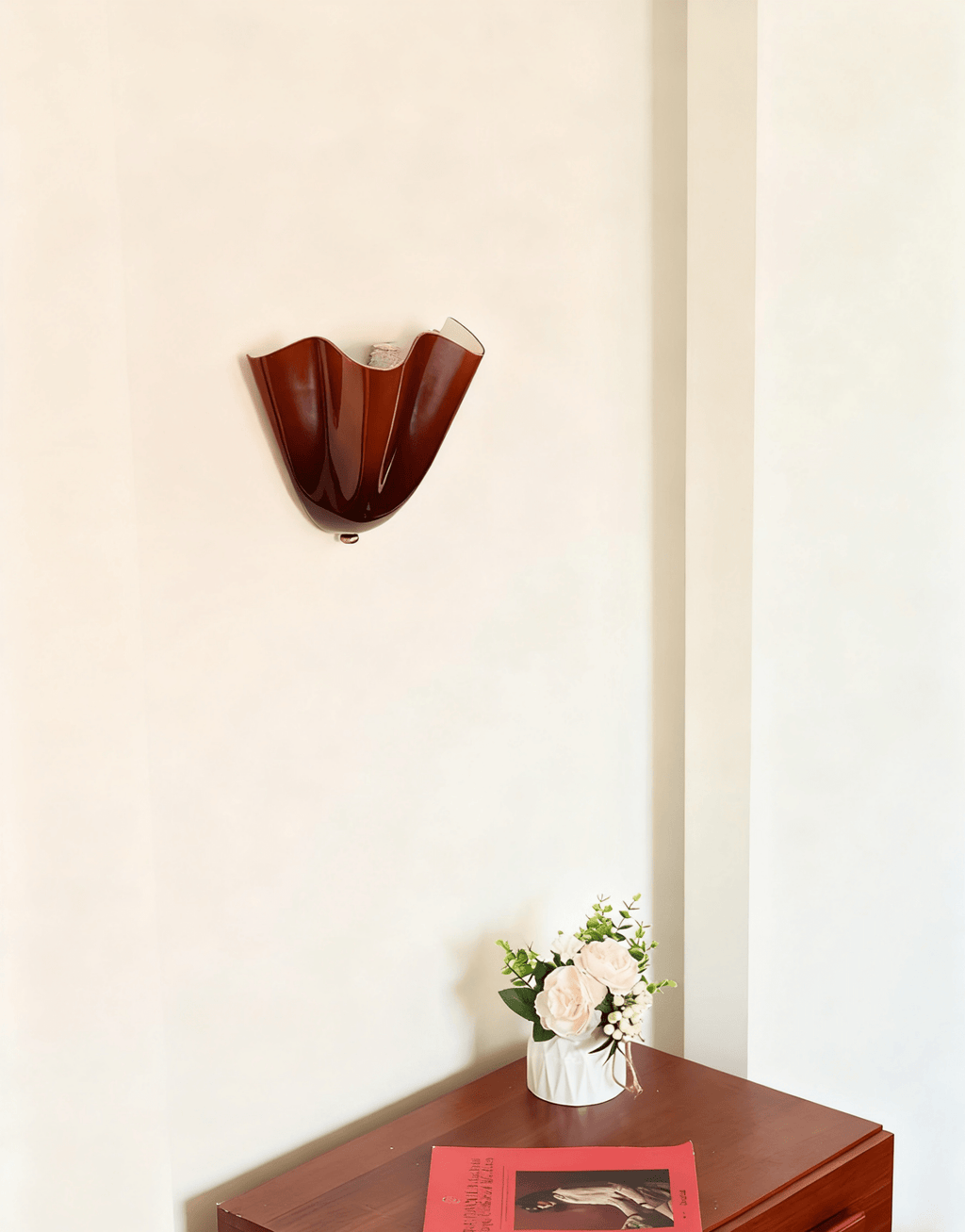 Petalia wall sconce sculptural petal form against a plain wall