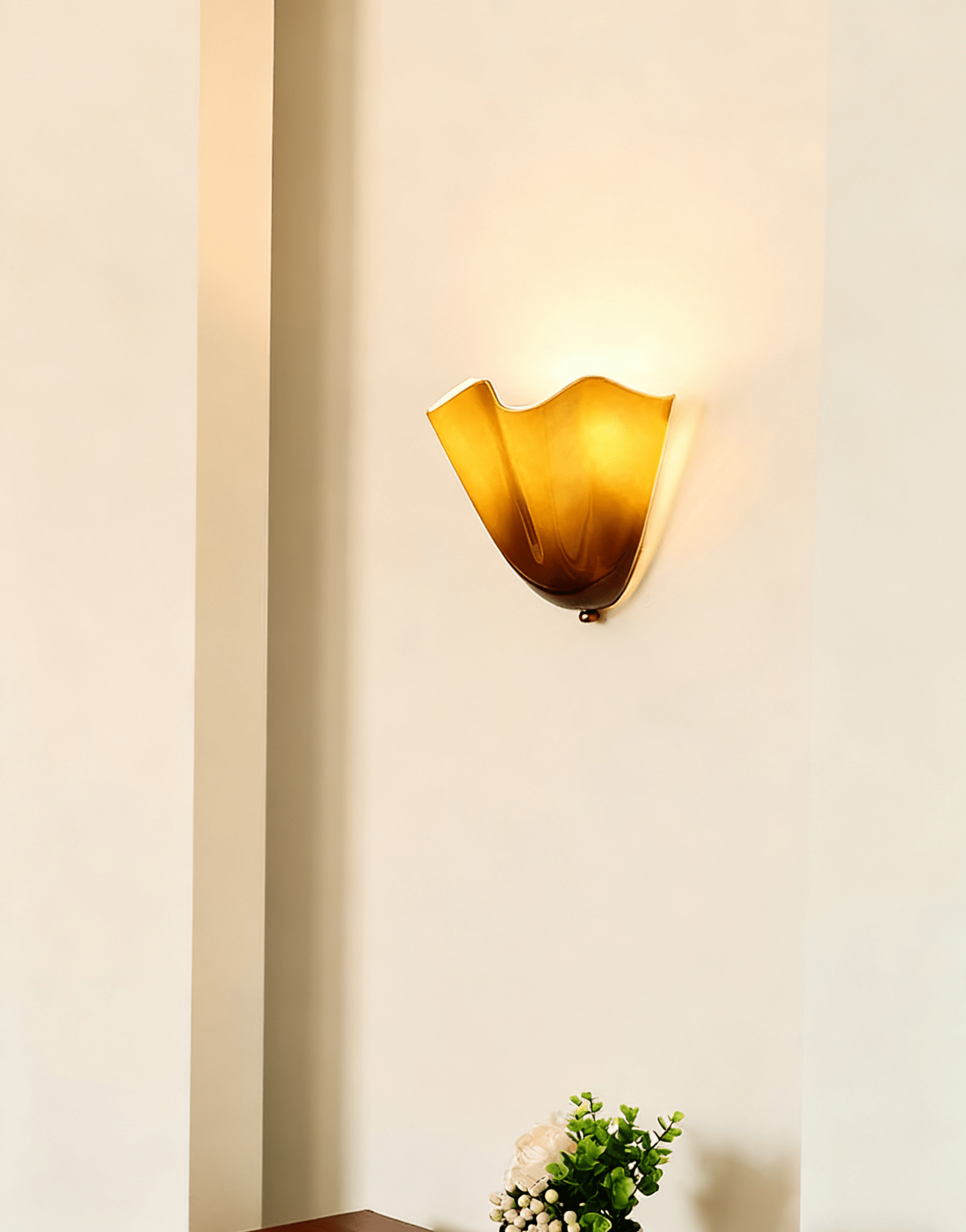 Petalia wall sconce detail of the bi-pin bulb fitting and glass