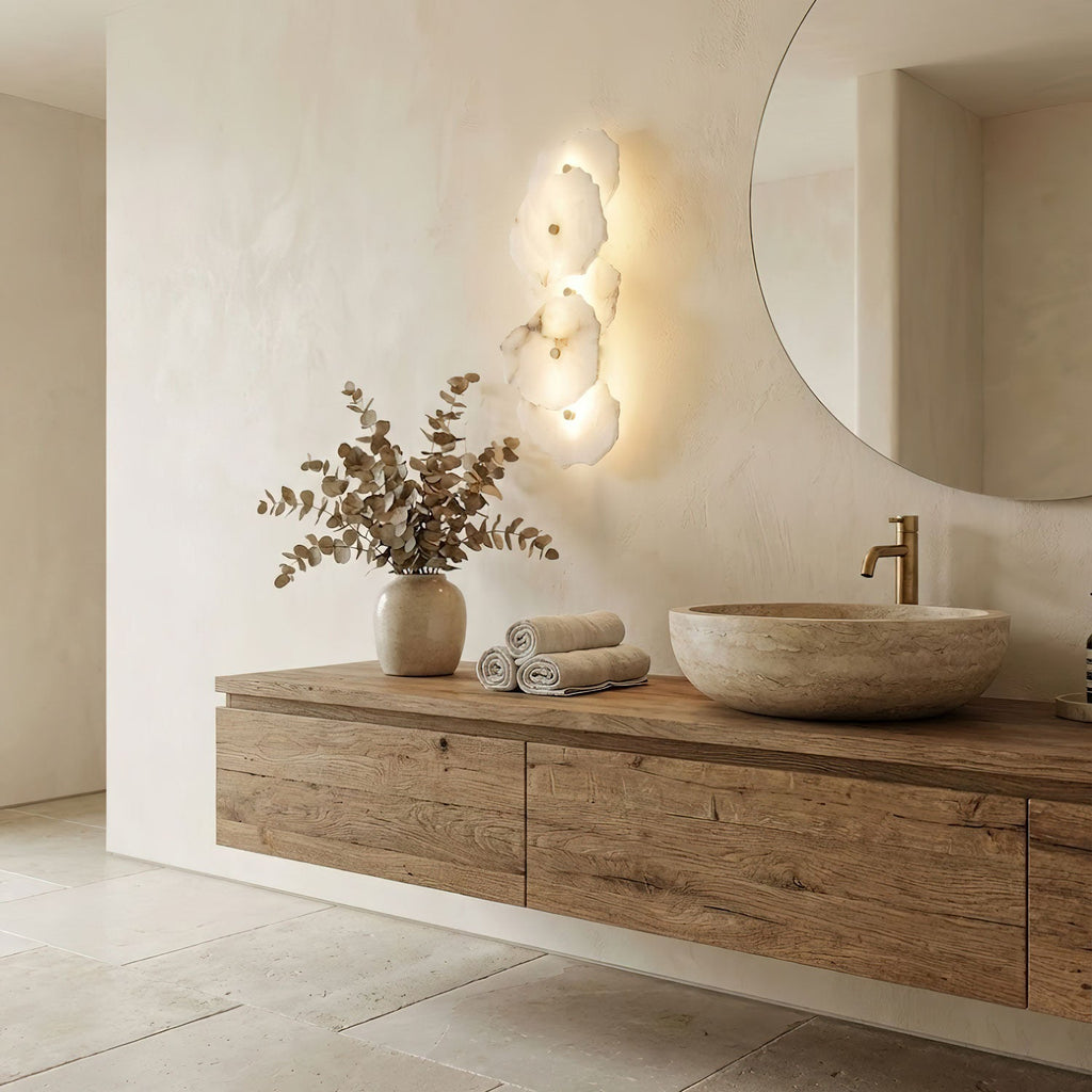 Alabaster wall sconce with gold detailing and stone shade
