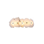 Wide five-head layout of the alabaster wall lamp, brass studs punctuating each translucent stone petal.