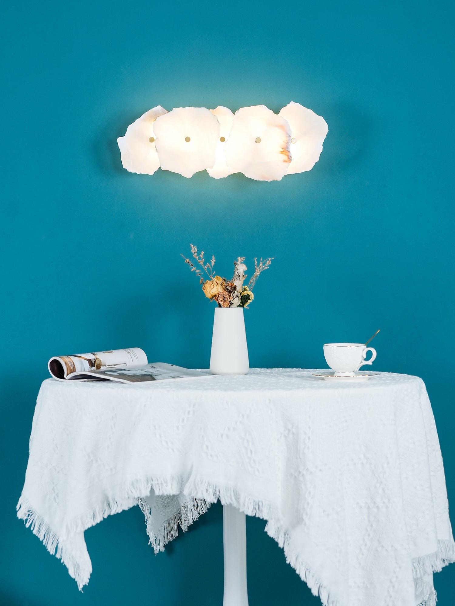 Alabaster stone wall light with gold finish and soft glow