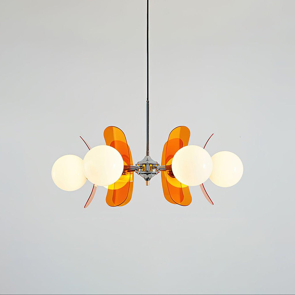 Sputnik chandelier with warm glass shades on each arm