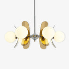 Sputnik chandelier with radiating arms and warm glass shades