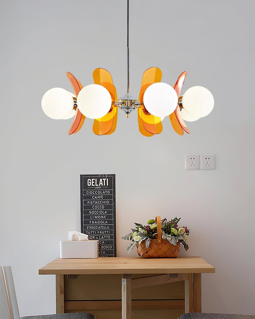 Sputnik chandelier with warm glass shades on iron arms