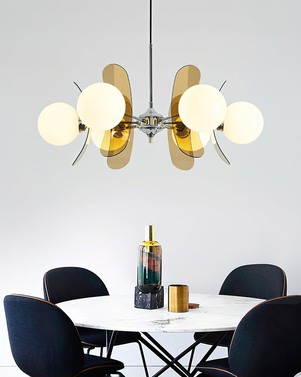 Sputnik chandelier with iron arms tipped in glass shades