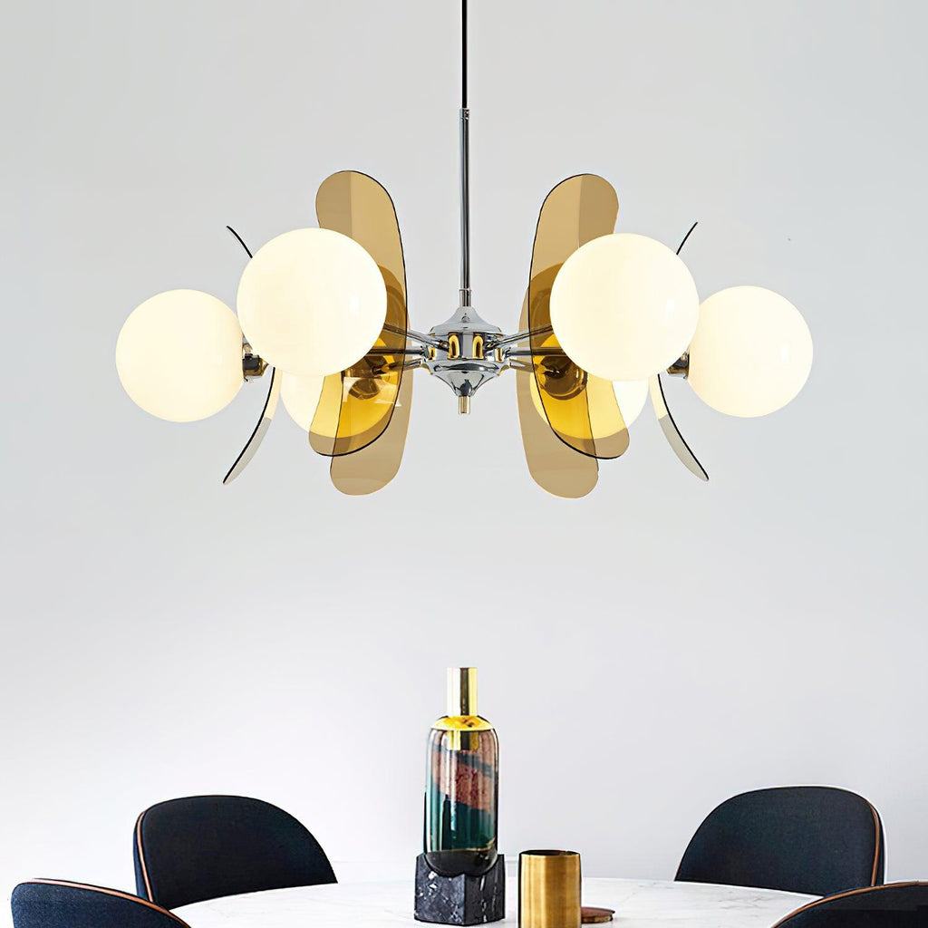 Iron and glass Sputnik chandelier glowing warmly