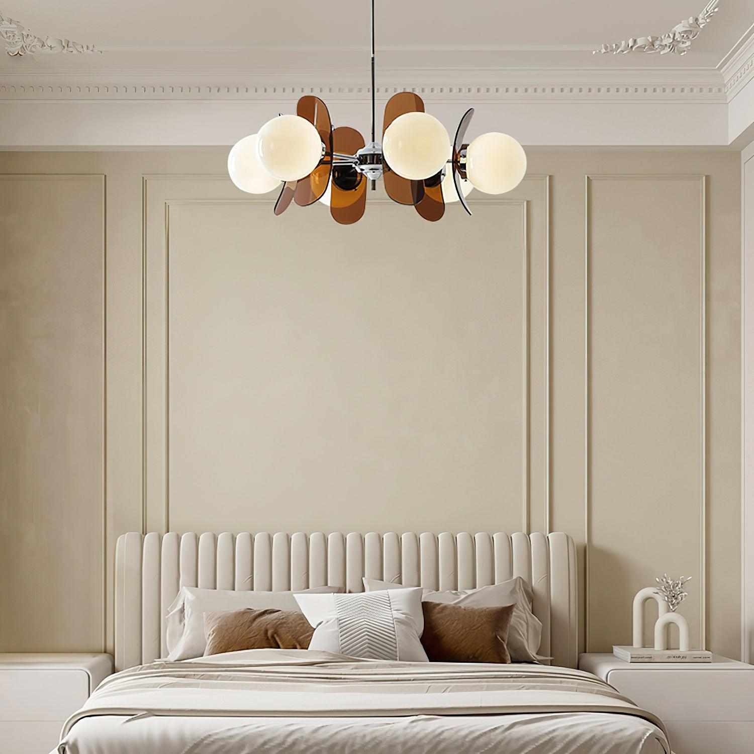 Iron Sputnik chandelier with warm glass shades detail