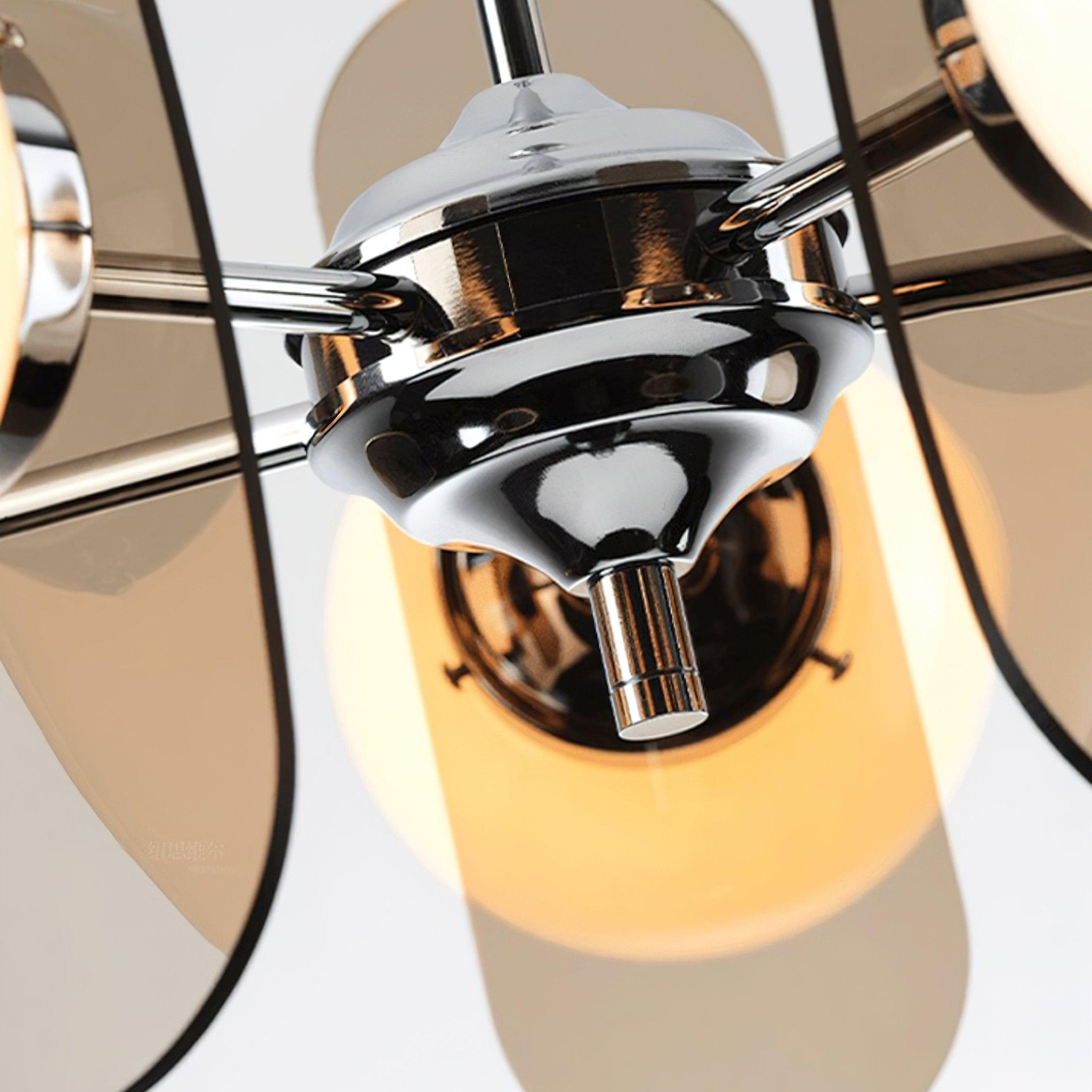 Sputnik chandelier with chrome core and glass globes lit