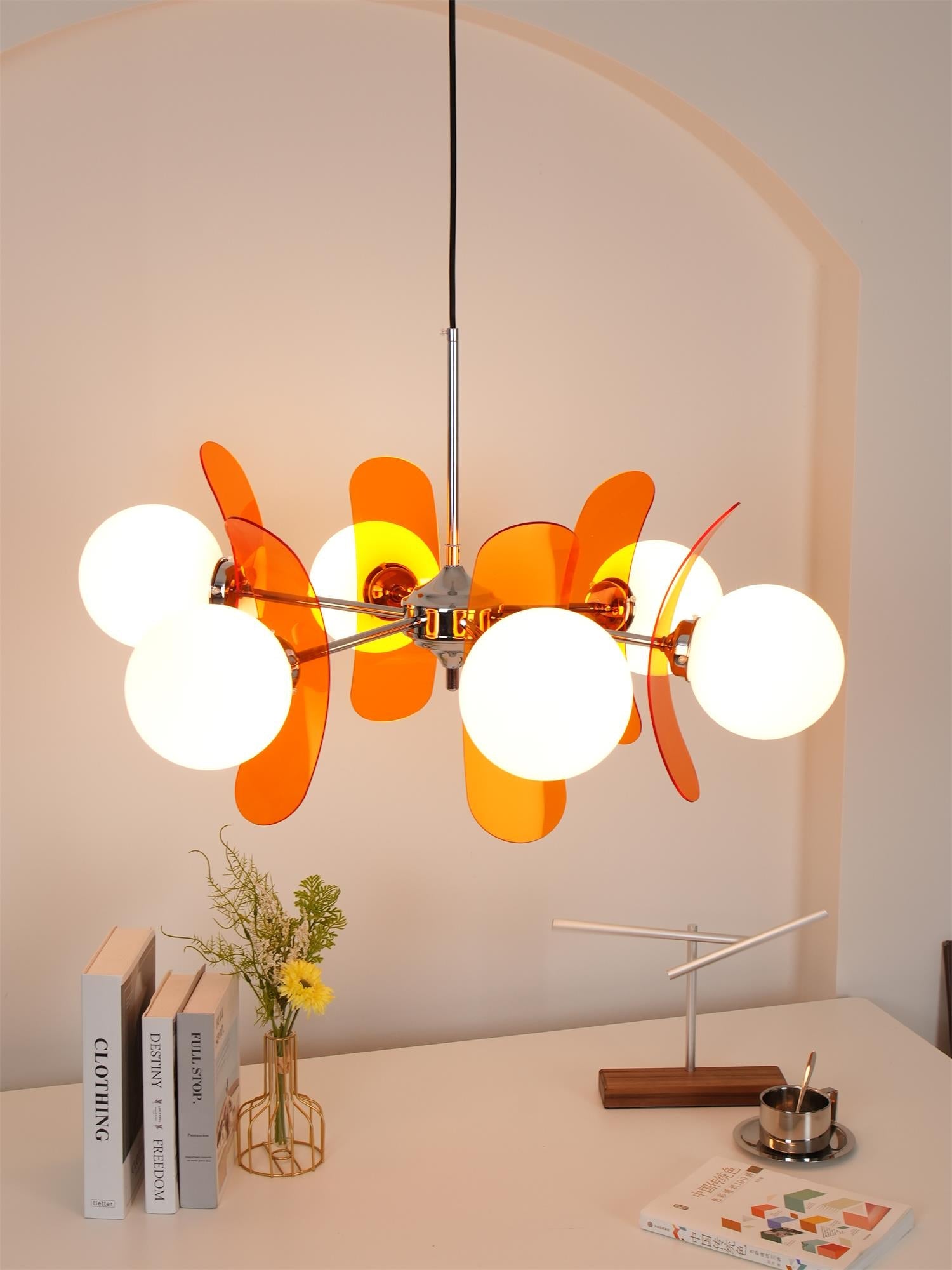 Sputnik chandelier with chrome arms and soft glass shades