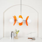 Multi-arm chandelier with soft glass shades and metallic sheen