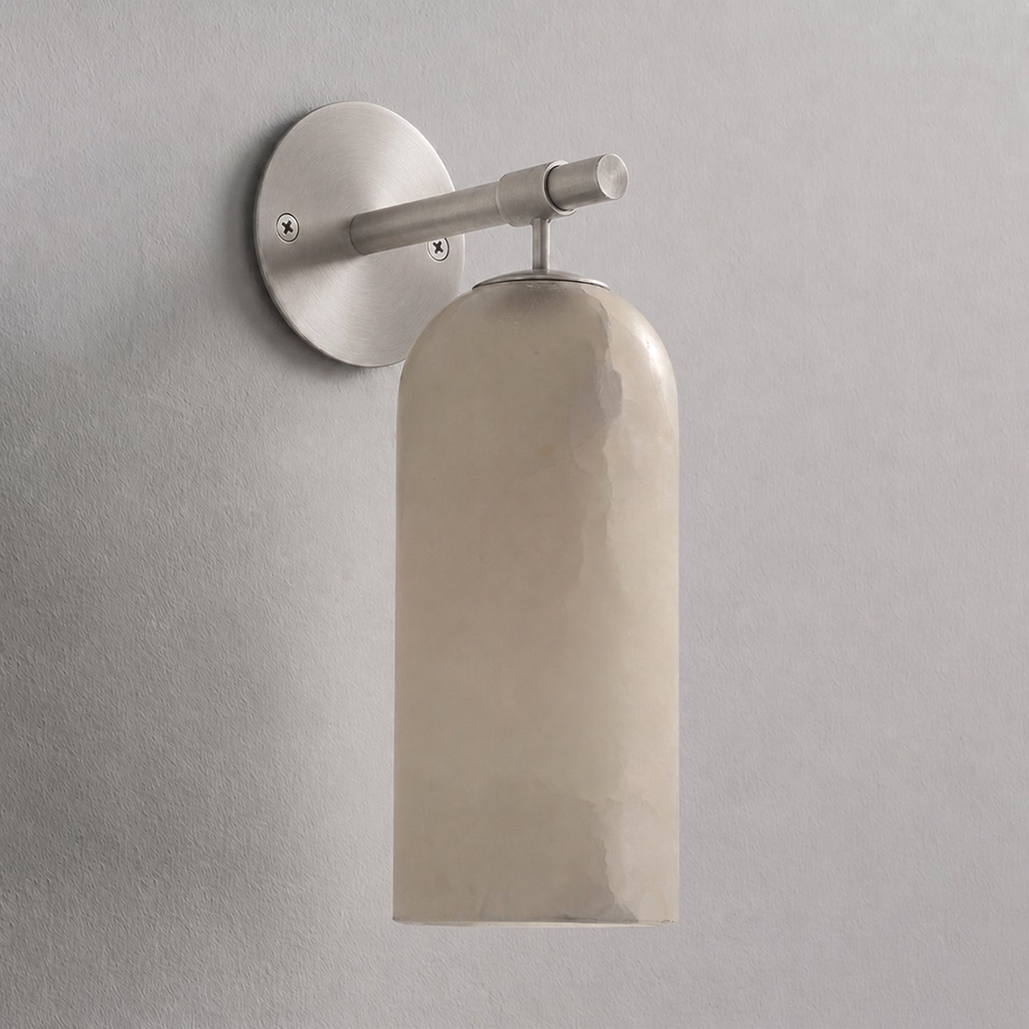 Alabaster wall light showing natural stone veining and gold finish