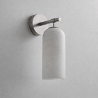White alabaster pillar wall light with a slim gold metal arm
