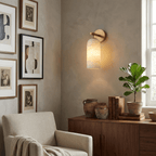 Alabaster cylinder sconce detail showing stone texture and glow