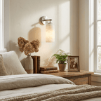 White alabaster pillar wall light with warm translucent glow