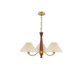 Isolated on white, the three-head version of this Clérachic chandelier shows its ceiling plate and chain clearly.