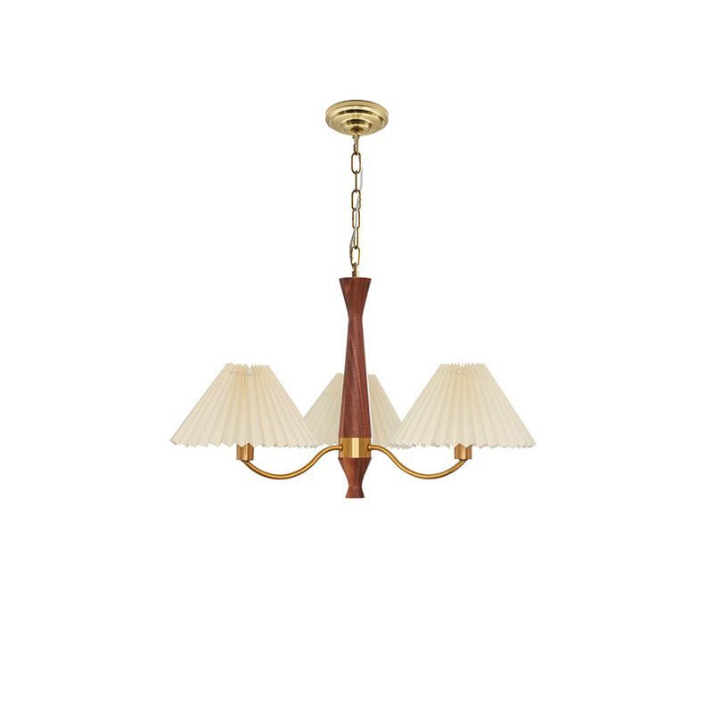 Isolated on white, the three-head version of this Clérachic chandelier shows its ceiling plate and chain clearly.