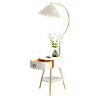 Photographed on white with no room setting, the Clérachic lamp shows its full height, open drawer, vase and phone on top.