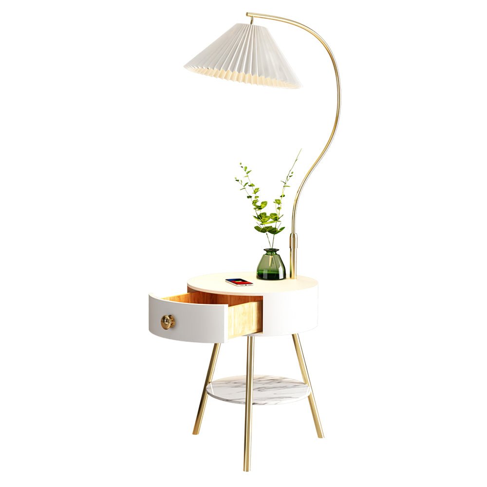 Photographed on white with no room setting, the Clérachic lamp shows its full height, open drawer, vase and phone on top.