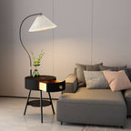 The black-finish Clérachic lamp stands beside the grey sofa, its drawer open to show the wood-lined interior.