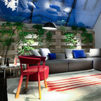 Verse arc floor lamp lit warmly in a calm interior