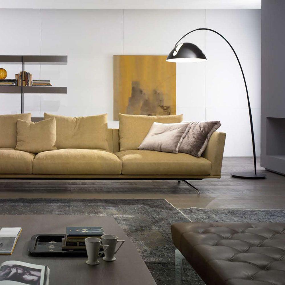 Verse arc floor lamp viewed across a styled room
