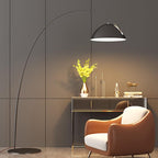 Verse arc floor lamp beside a console in a modern setting