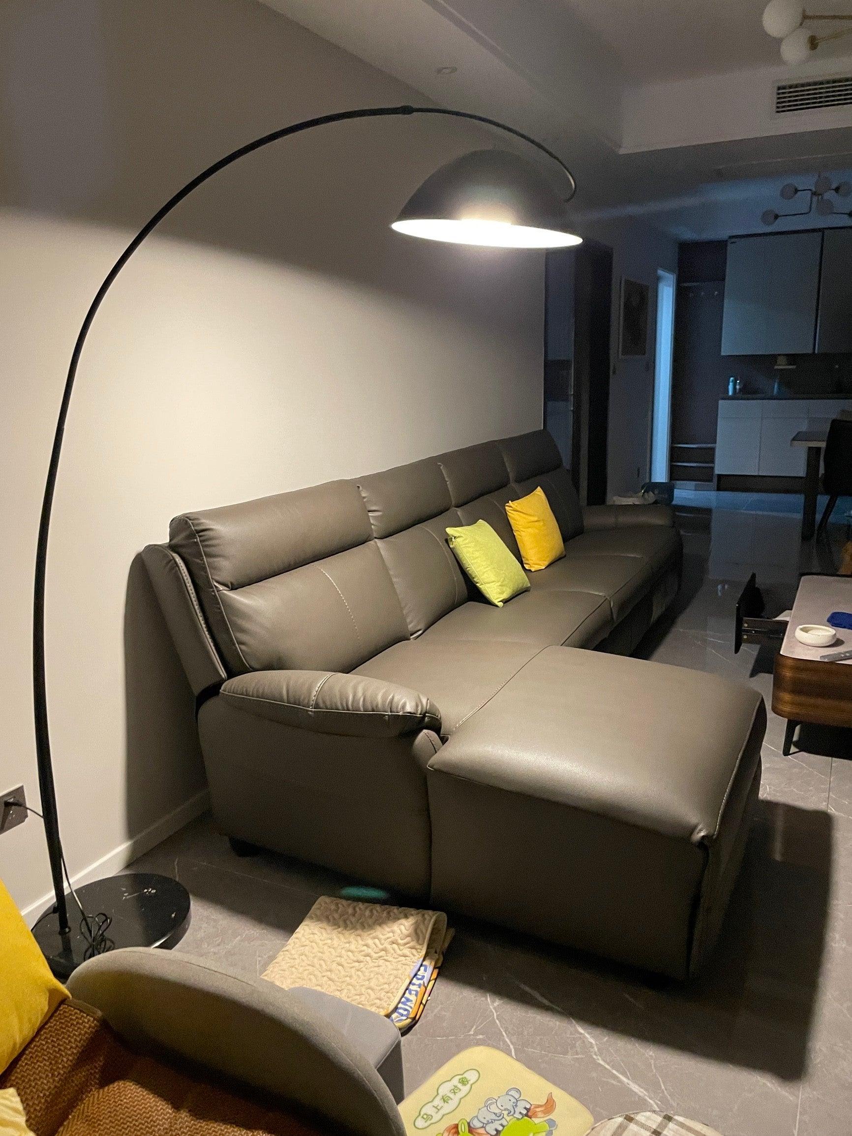 Verse arc floor lamp swiveling shade shown from the side