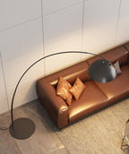 Verse arc floor lamp detail of the inline push-button switch on the cord