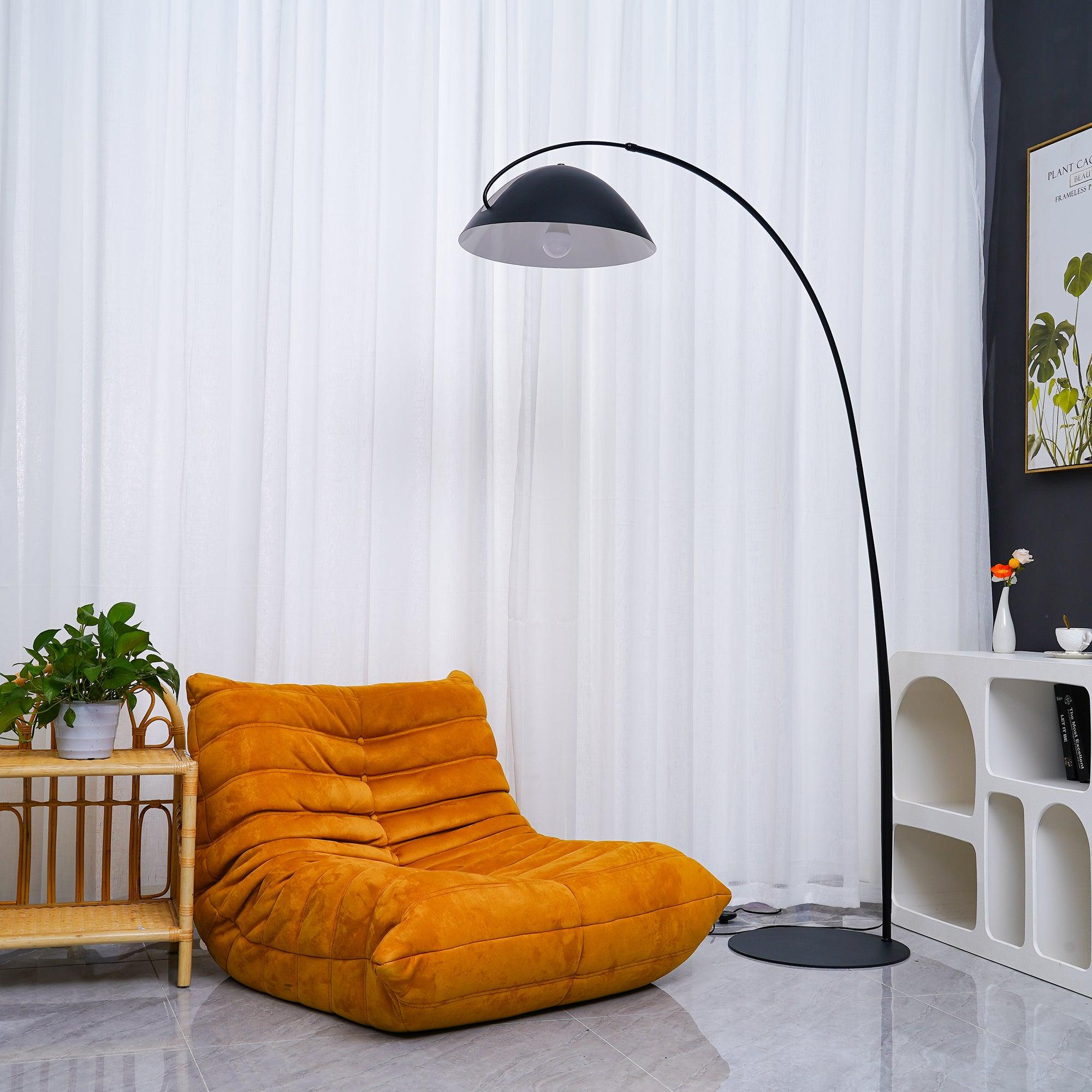 Verse arc floor lamp swiveling shade repositioned to direct light
