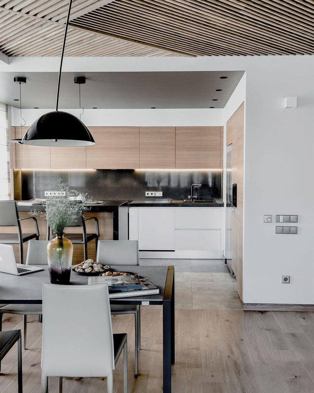 Verse arc floor lamp in a Scandinavian-styled interior