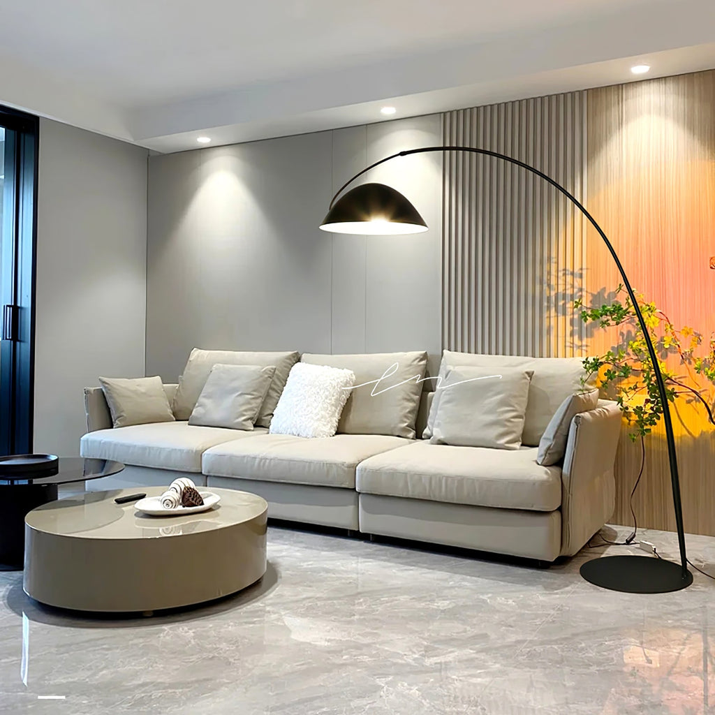 Verse arc floor lamp swiveling shade angled to one side
