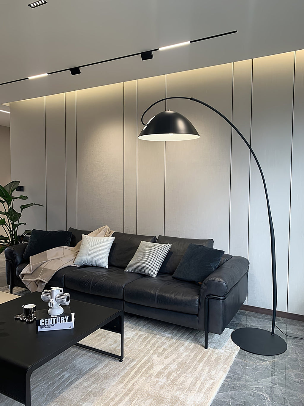 Verse arc floor lamp standing in a contemporary lounge