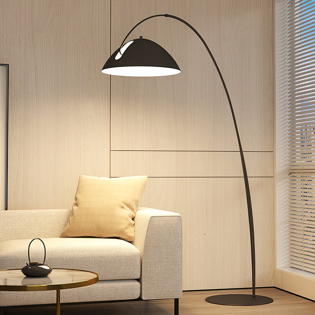Verse arc floor lamp in a styled bedroom corner
