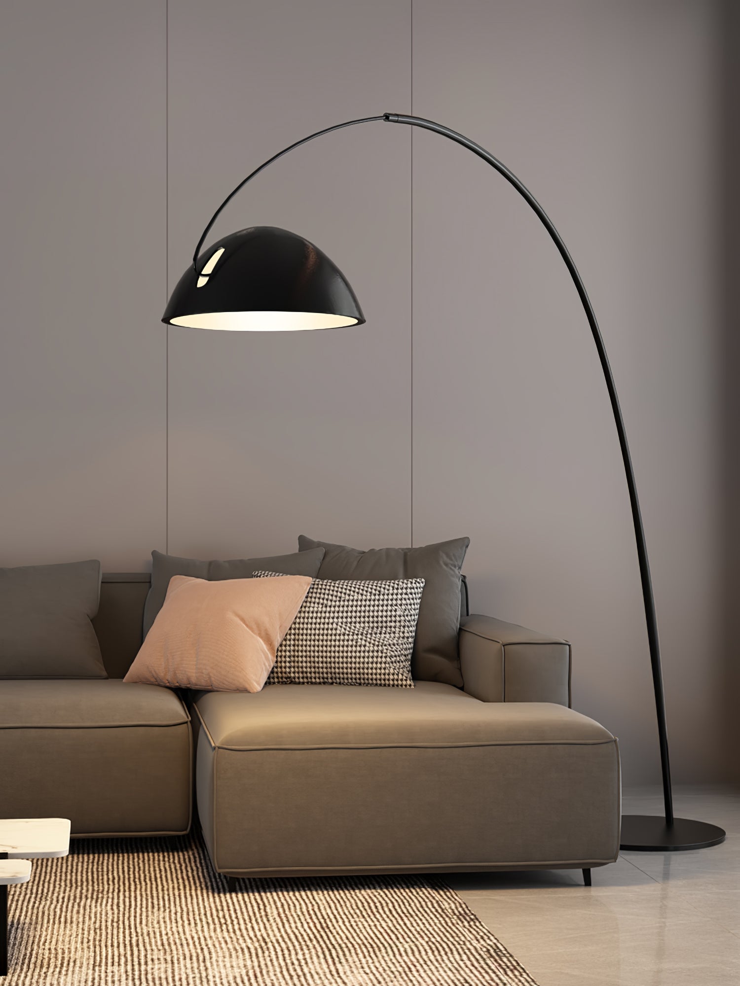 Verse arc floor lamp lit as a reading light over a chair