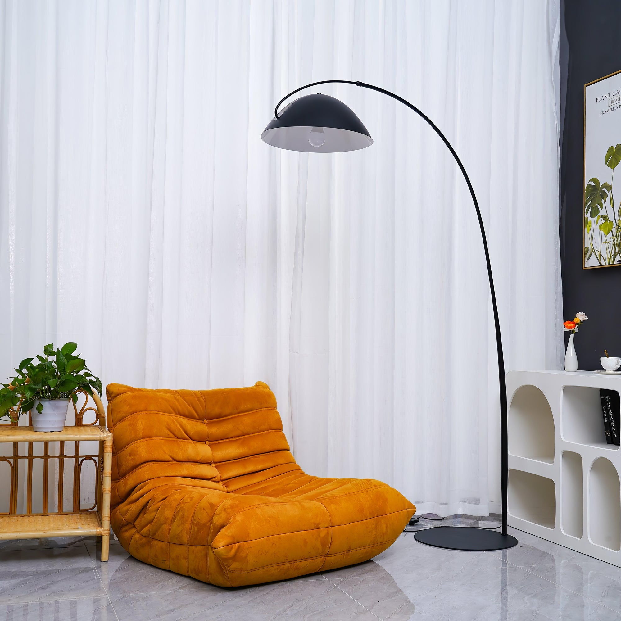 Verse arc floor lamp in a styled living room corner