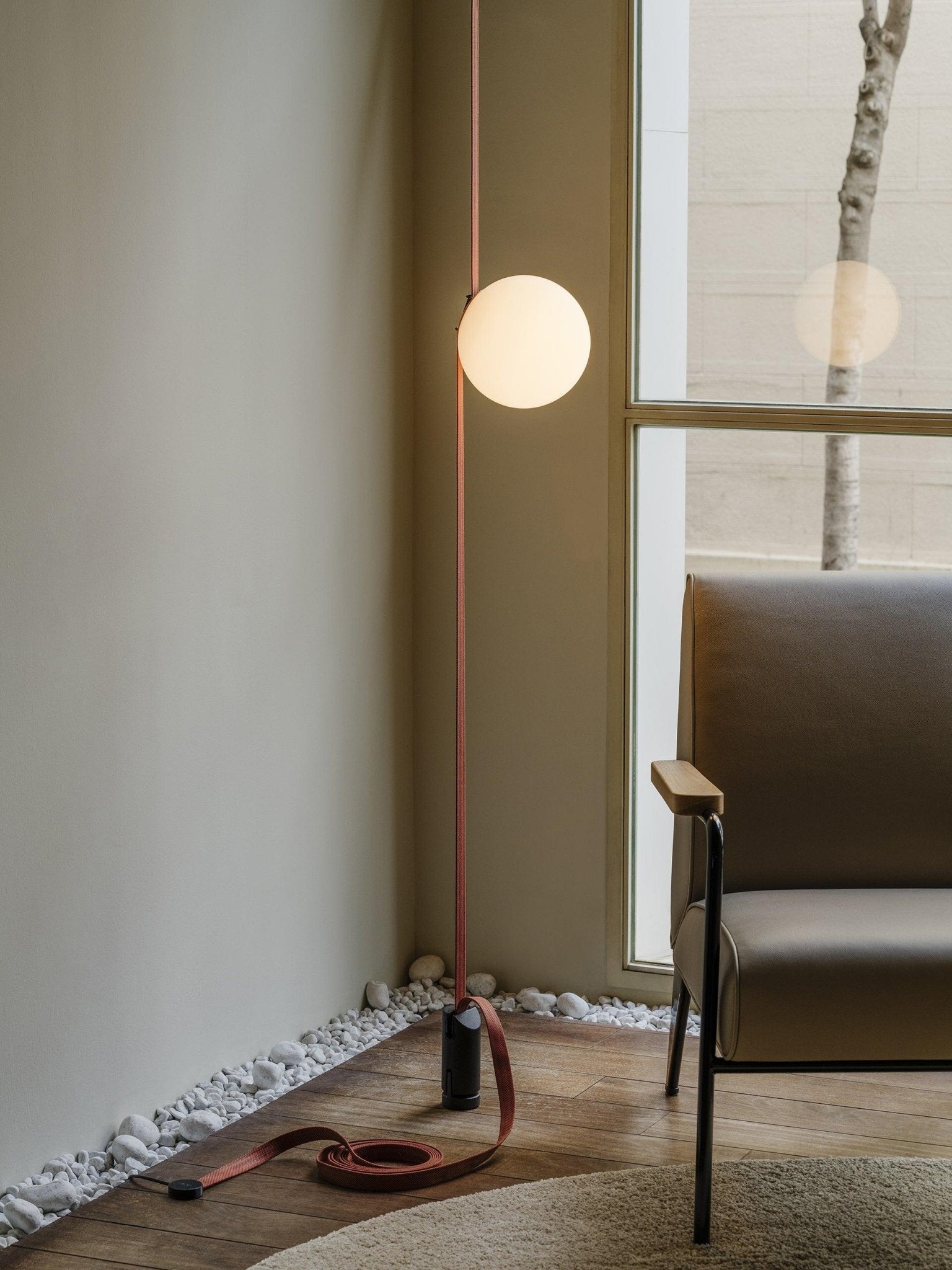 Belt pendant light glass globes and straps detail