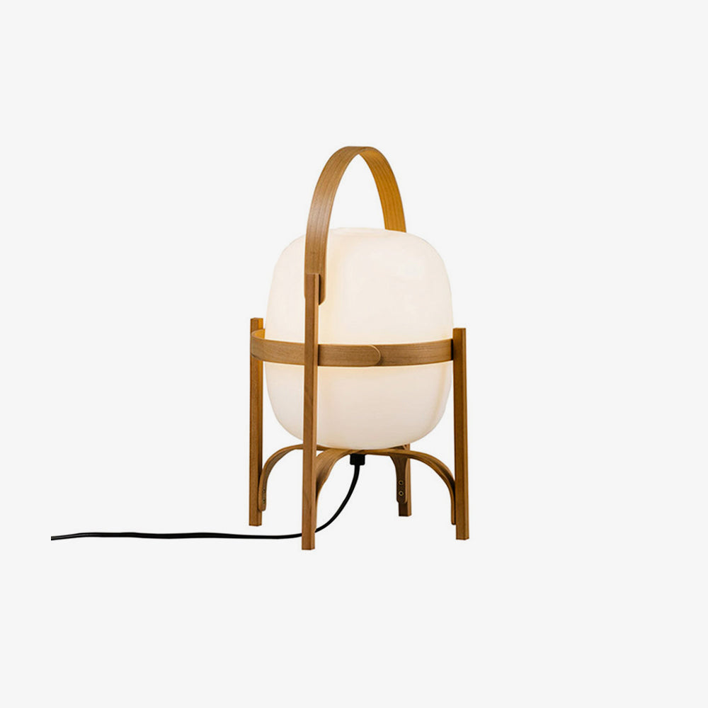 Portable lantern table lamp in wood and glass lit warmly