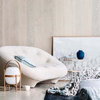 Portable wood lantern lamp glowing softly indoors
