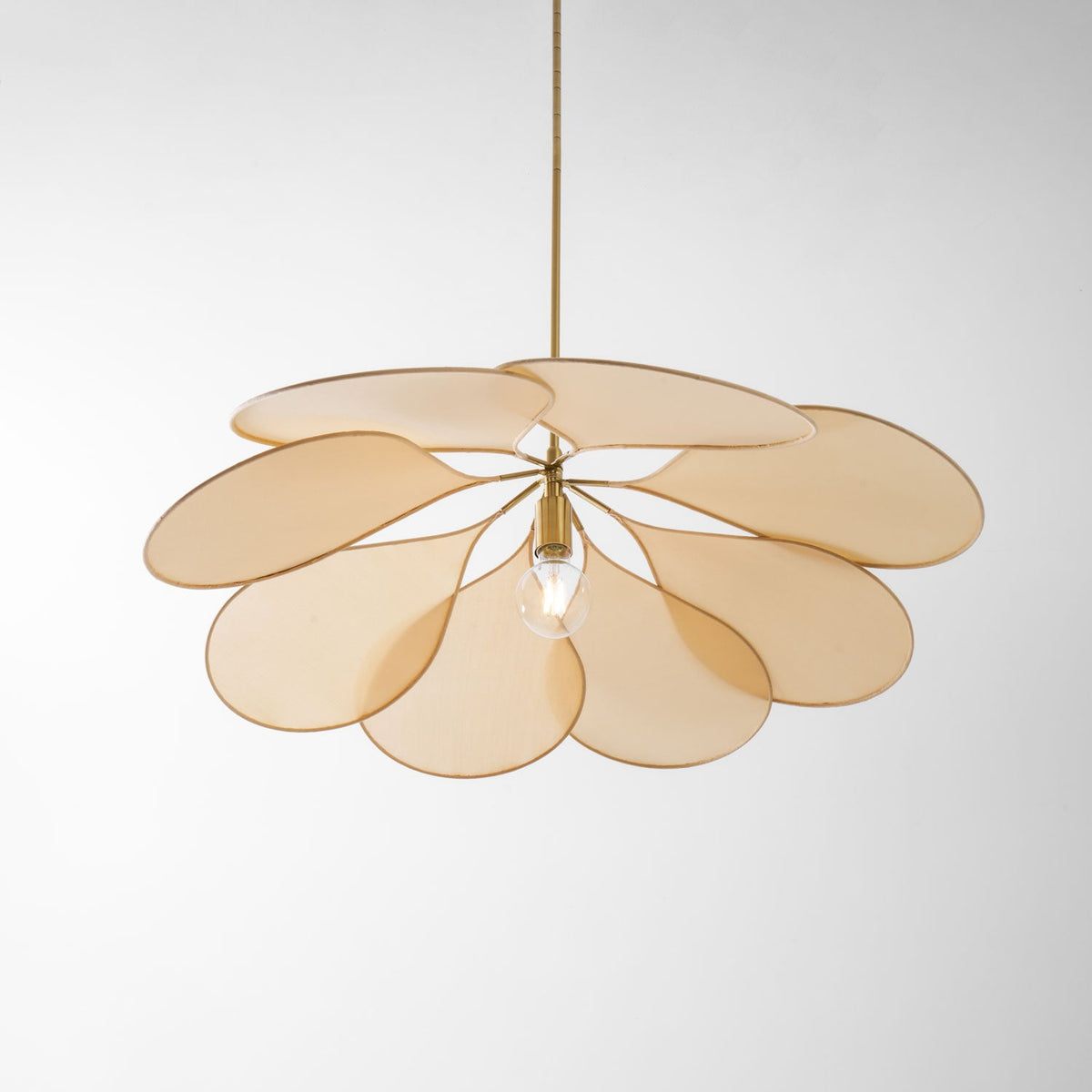 Studio shot of this Clérachic pendant lamp, its beige petals fanned into a wide dome around a bare bulb.