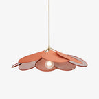 Studio shot of this Clérachic pendant light, its fanned fabric petals shading from deep terracotta to soft pink around a bare bulb.