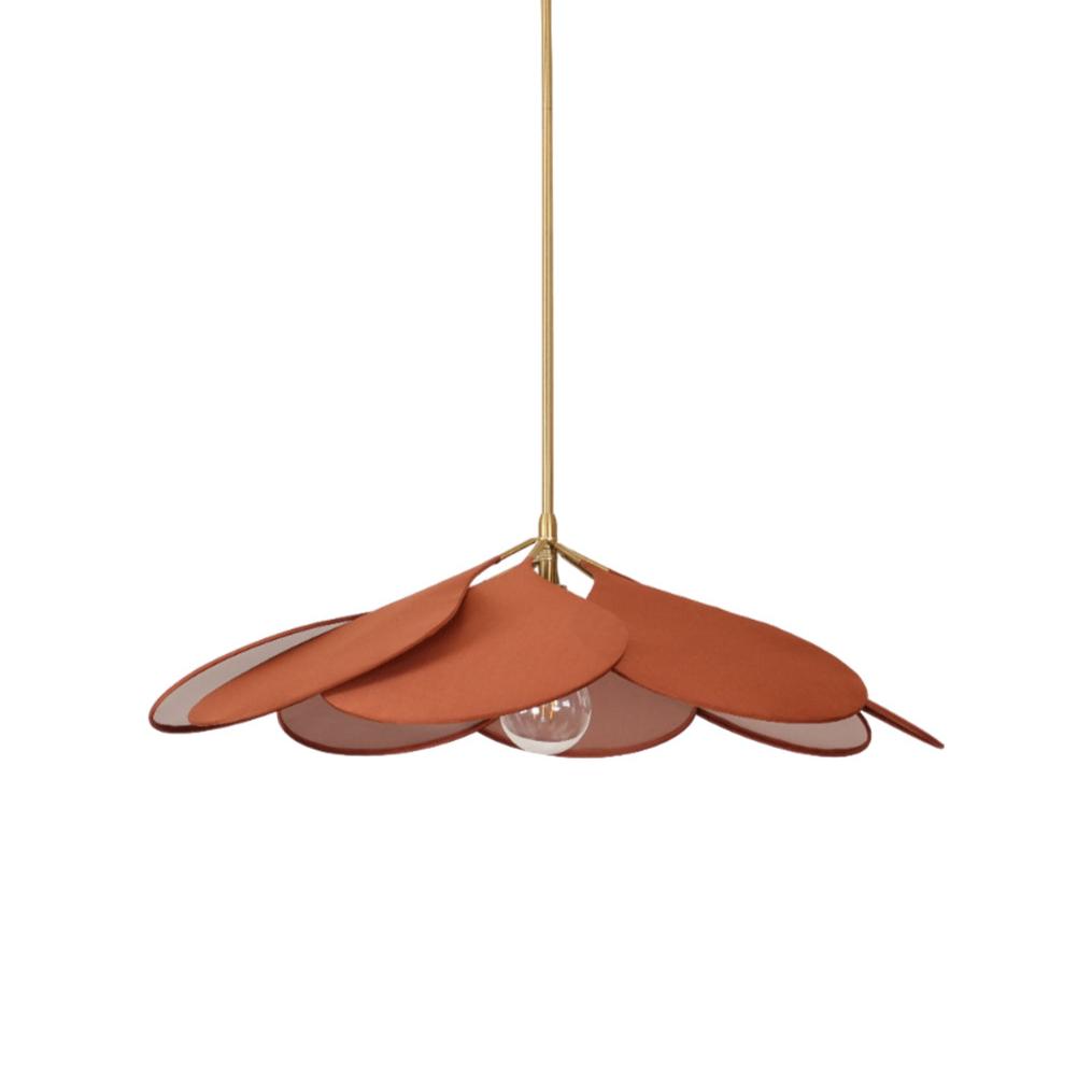 This Clérachic pendant lamp in terracotta petals hangs from a brass stem against a plain white background, its bulb visible beneath.